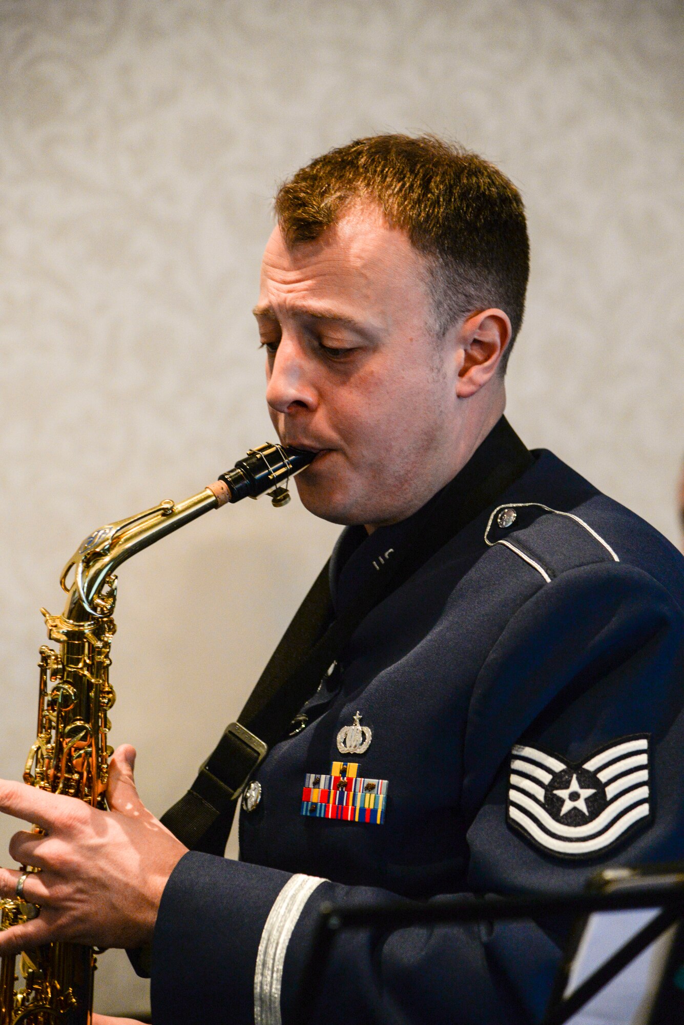 Tech. Sgt. Anthony Balester, Air Force Band of Mid-America saxophone player, performs at the Martin Luther King luncheon Jan. 14, 2016 at Scott Air Force Base, Illinois. The luncheon allowed individuals to gather to celebrate the man who led the civil rights movement for racial equality and desegregation. (U.S. Air Force photo/ Airman Daniel Garcia)