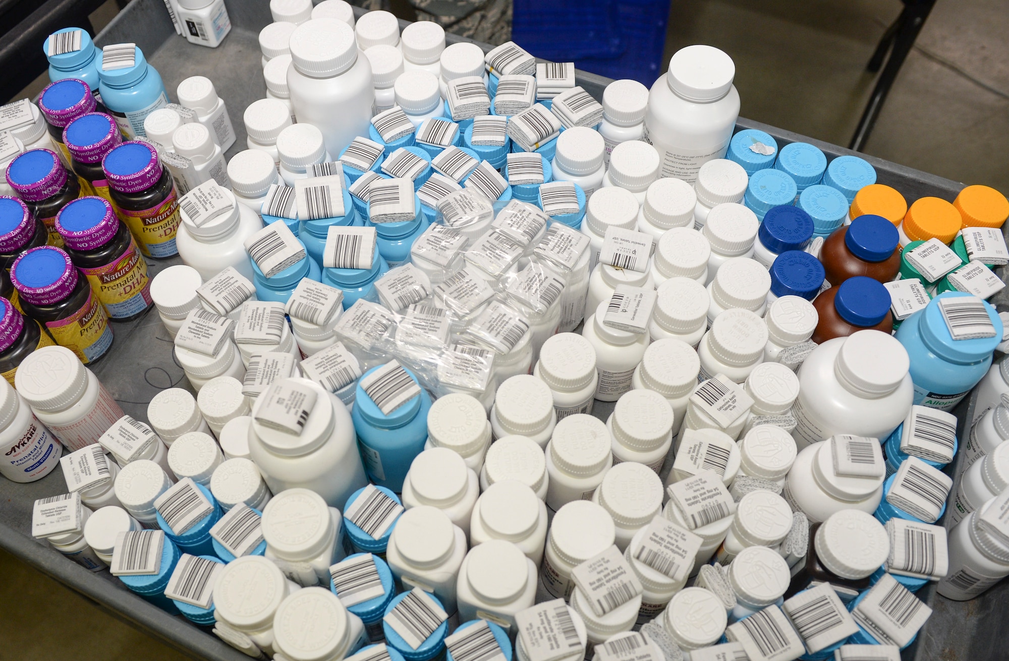 A shipment of medicine sits on a push cart Jan. 19, 2016, at McConnell Air Force Base, Kan. After processing and organizing the shipment, the 22nd Medical Support Squadron logistics warehouse Airmen, take the medication to the base pharmacy where it are stocked for patients to pick-up after prescription. (U.S. Air Force photo/Senior Airman Colby L. Hardin)