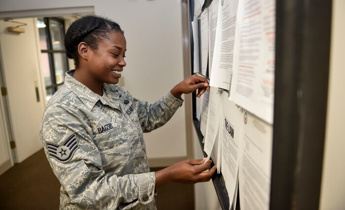 Staff Sgt. Torri Bagsby, 628th Air Base Wing chaplain assistant, updates the chapel’s bulletin board  Jan. 8, 2016 at Joint Base Charleston, S.C. The Joint Base Charleston Inspection Program is part of the Air Force Inspection System and falls under the Air Mobility Command’s Inspection Program. In April, a team of inspectors from AMC will be assessing our program in person. (U.S. Air Force Photo/Staff Sgt. Jared Trimarchi)