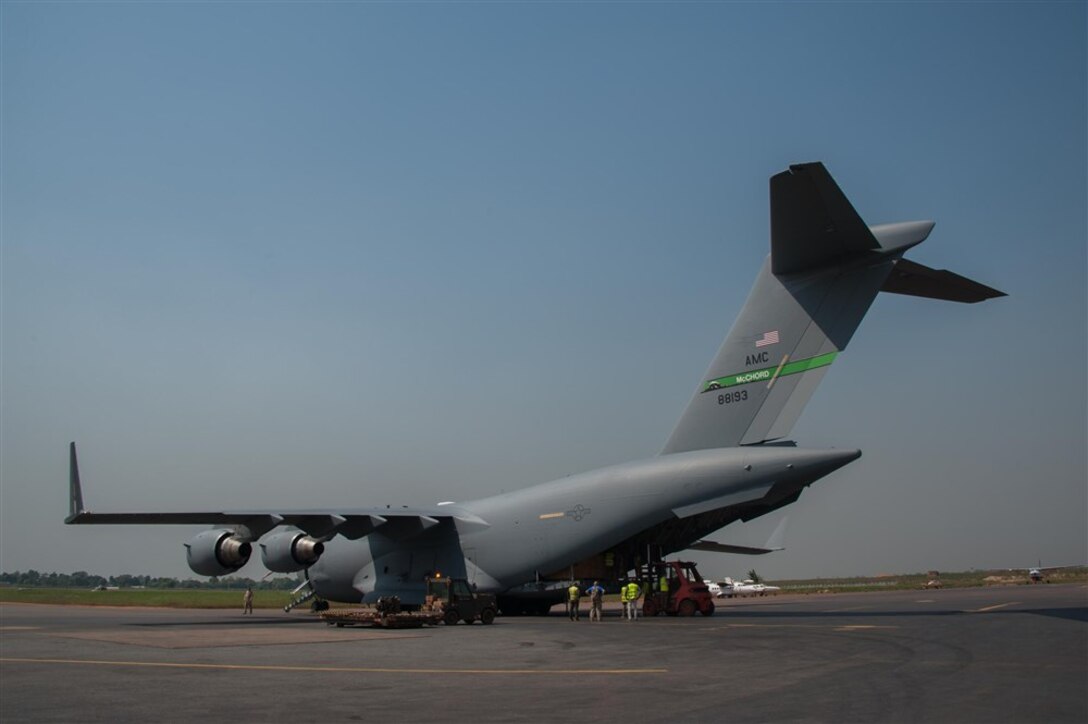 A U.S. Air Focre C-17 Globemaster III arrives in Bangui, Central African Republic, Dec. 15, 2015. Both the U.S. and France provided military manpower in Libreville, Gabon, and the Central African Republic’s capital, Bangui, to help with the loading/unloading and transport of equipment. The result was the timely deployment of more than 450,000 pounds of vital equipment and vehicles for the Gabonese military. (Photo courtesy of French military, ADC Laminette)