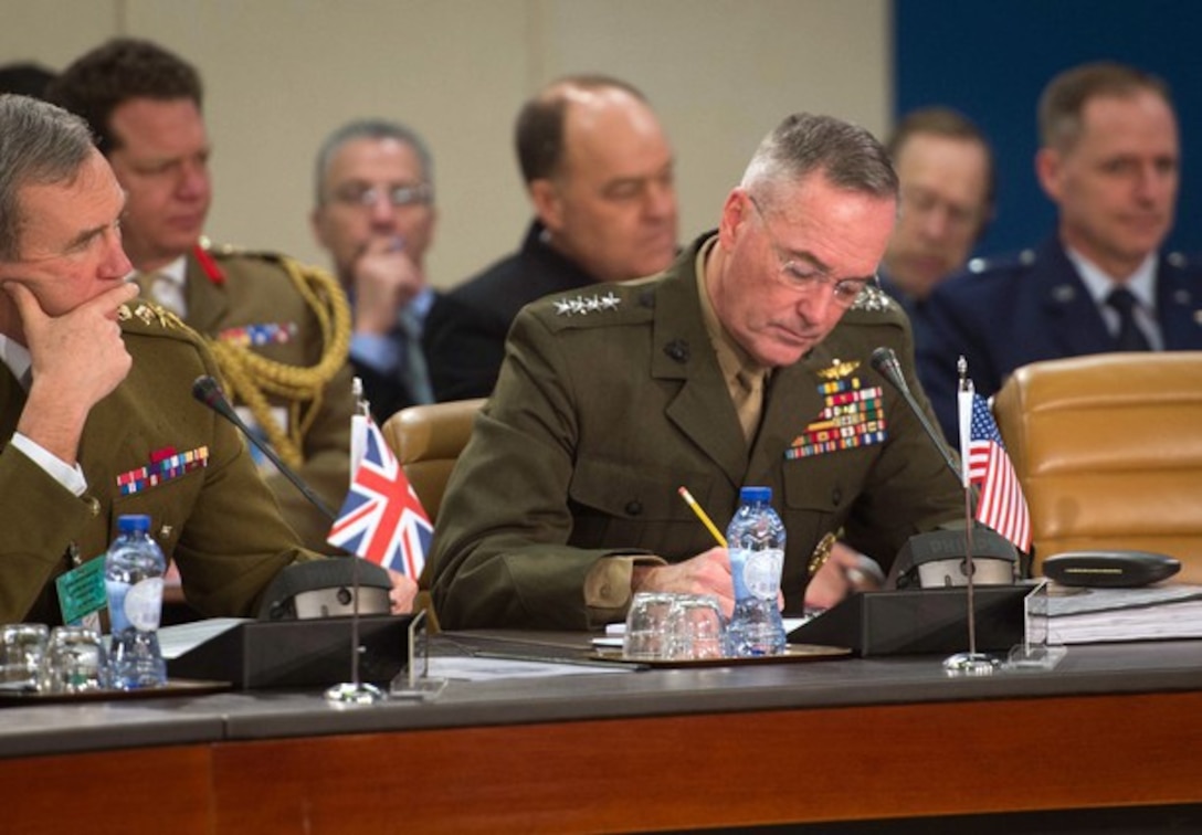 U.S. Marine Corps Gen. Joseph F. Dunford Jr., chairman of the Joint Chiefs of Staff, takes notes during a meeting at NATO headquarters in Brussels, Jan. 21, 2016. (DoD photo by D. Myles Cullen)