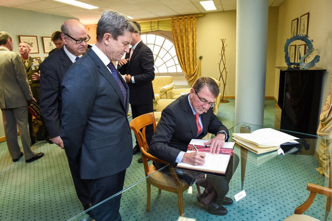 U.S. Defense Secretary Ash Carter signs a guest book at Ecole Militaire in Paris, Jan. 21, 2016. Carter met with officials and delivered a speech at the military school. DoD photo by Army Sgt. 1st Class Clydell Kinchen