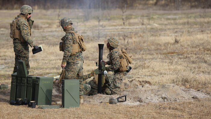 Marines with 2nd Battalion, 2nd Marine Regiment,  launch  a round during a live-fire mortar exercise with 81 mm mortar systems in preparation for the unit’s upcoming deployment at Marine Corps Base Camp Lejeune, North Carolina, Jan. 21,2016. The Marines worked with the mortar systems until the late evening, sending more than 350 rounds downrange, and accomplished their goal of having more than 90 percent of their rounds impact on their designated targets. 