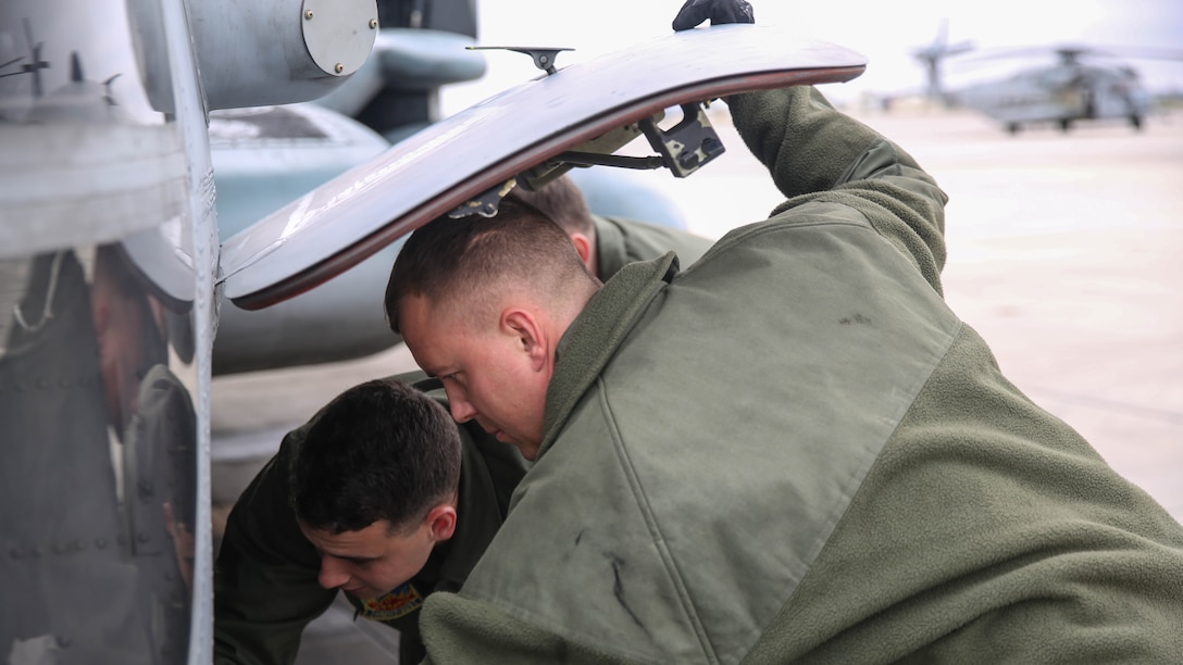 First Lt. David Peck (right) and 1st Lt. Nolan Vihlen (left), Marines with Marine Heavy Helicopter Training Squadron 302, conduct vehicle checks on a CH-53E Super Stallion before their departure from Marine Corps Air Station New River, N.C., Jan. 7, 2016. Thorough and consistent pilot training is the best way to ensure aviation safety; HMHT-302 teaches its student pilots proper procedures for safety checks to ensure the highest level of safety and preparedness prior to any flight.  