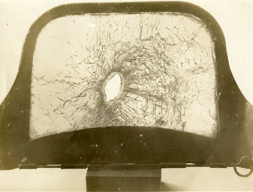 Casualties among pilots were common during World War I, though miraculously, Private John E. Tynan, a Nieuport pilot, very narrowly managed to avoid his own brush with death. He continued to serve with the 26th Aero Squadron in France until the end of the war. He captioned this photo: "Bullet hole through windshield of my Nieuport over Chateau Thierry, France, November 1918 -- happily at a 90 degree angle." (U.S. Air Force photo)
