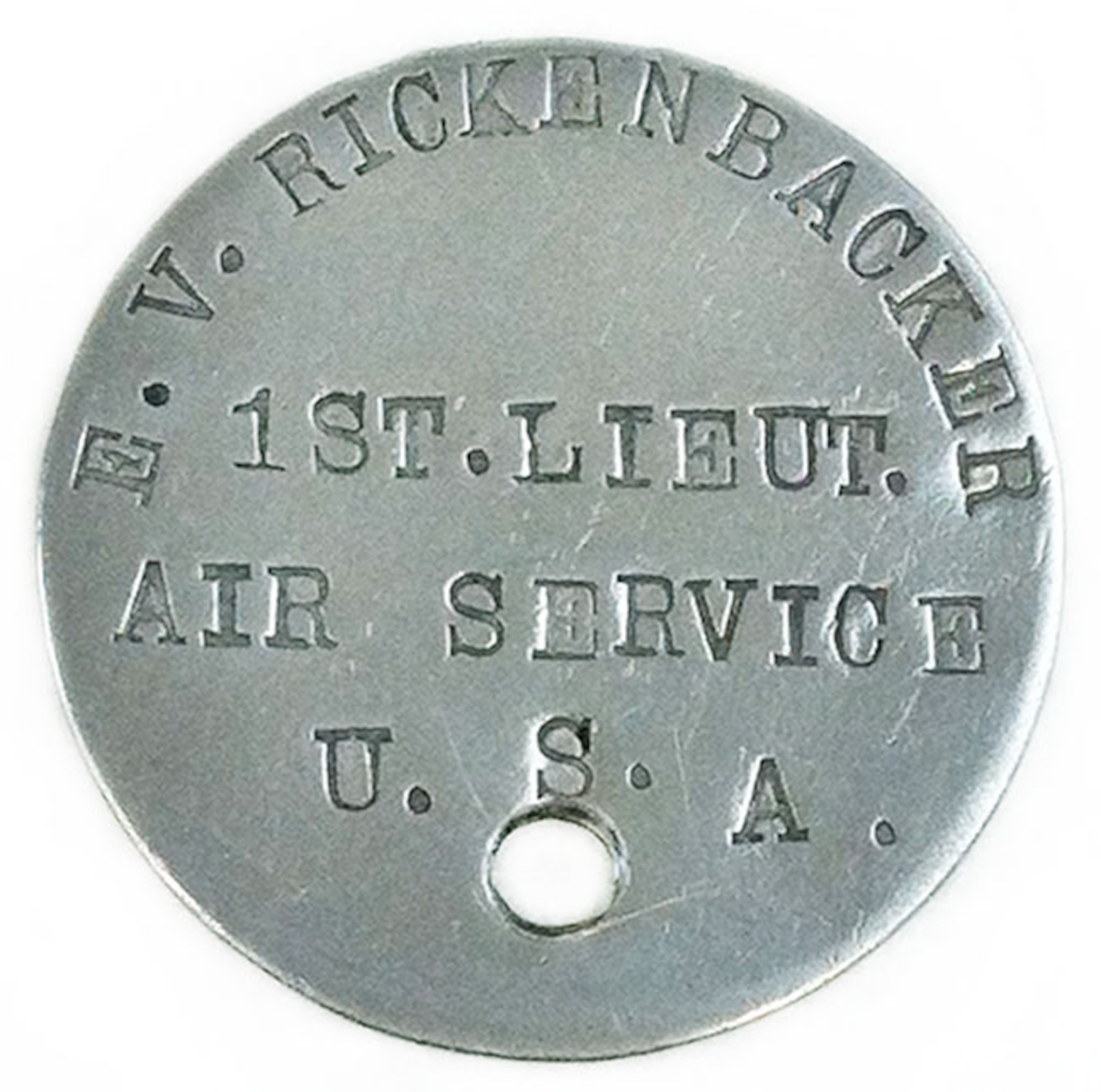 Commander of the "Hat-in-Ring" 94th Aero Squadron, Capt. Edward V. Rickenbacker was a World War I American fighter ace. He had the most aerial victories of all American fighter pilots during the war with 26. His dog tag shown here was issued to him as a First Lieutenant. It reads: E.V. RICKENBACKER, 1ST. LIEUT., AIR SERVICE, U.S.A. (U.S. Air Force photo)