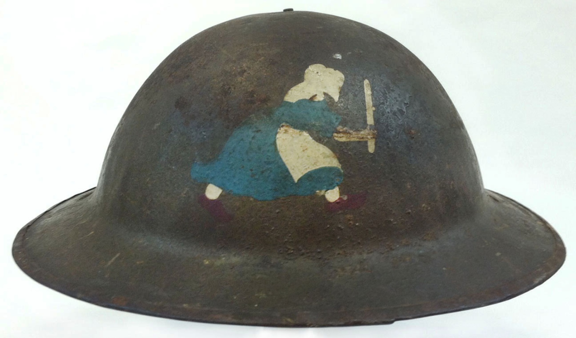 This helmet was worn during World War I by Lt. Milton K. Lockwood of the 50th Aero Squadron, who piloted DH-4 aircraft and survived three crash landings. The 50th Aero Squadron insignia is the Dutch Girl, the trademark emblem of Old Dutch Cleanser, which was adopted to represent that the squadron's focus was to “clean up on Germany” during WWI. (U.S. Air Force photo)