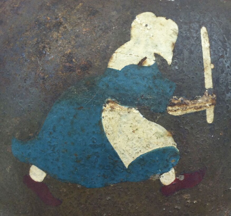 This helmet was worn during World War I by Lt. Milton K. Lockwood of the 50th Aero Squadron, who piloted DH-4 aircraft and survived three crash landings. The 50th Aero Squadron insignia is the Dutch Girl, the trademark emblem of Old Dutch Cleanser, which was adopted to represent that the squadron's focus was to “clean up on Germany” during WWI. (U.S. Air Force photo)