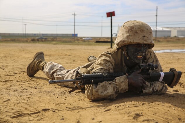 Private James N. Gathondu, Charlie Company, 1st Recruit Training Battalion, low crawls with his rifle during an event of the Crucible at Marine Corps Base Camp Pendleton, Calif., Jan. 13. Gathondu graduated recruit training as the Company Ironman, the most physically fit Marine in his company. Following recruit training, he will move on to Marine Combat Training in Camp Pendleton, Calif., and then on to his military occupational specialty school for his job as a motor transportation operator. He plans on making a career out of Marine Corps. Gathondu is a native of Kikuyu, Kenya, and was recruited out of Recruiting Station Fort Worth, Texas.
	
