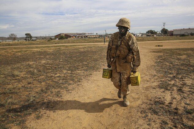 Private James N. Gathondu, Charlie Company, 1st Recruit Training Battalion, runs with ammunition cans during an event of the Crucible at Marine Corps Base Camp Pendleton, Calif., Jan. 13. Throughout training, he would always remind the recruits in his platoon how life for him was in Kenya and how they shouldn’t take anything they were given for granted while in training. He recalled reminding them they had all made the decision to join, and they should try harder because they are being given everything they need, especially the chance to earn the title, Marine. Gathondu is a native of Kikuyu, Kenya ,and was recruited out of Recruiting Station Fort Worth, Texas.