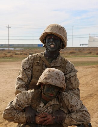 Private James N. Gathondu, Charlie Company, 1st Recruit Training Battalion, conducts a buddy drag with a fellow recruit during an event of the Crucible at Marine Corps Base Camp Pendleton, Calif., Jan. 13. Gathondu spent most of his life in Kenya where he made the decision to become a Marine and be a part of the Corps’ rich heritage and traditions. Following recruit training, he will move on to Marine Combat Training in Camp Pendleton, Calif., and then on to his military occupational specialty school for his job as a motor transportation operator. He plans on making a career out of Marine Corps. Gathondu is a native of Kikuyu, Kenya, and was recruited out of Recruiting Station Fort Worth, Texas. 