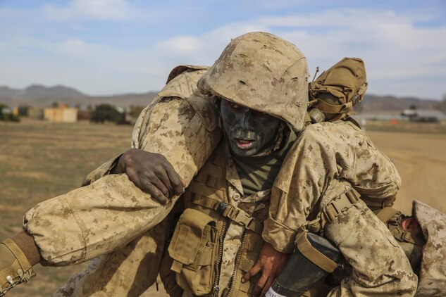 Private James N. Gathondu, Charlie Company, 1st Recruit Training Battalion, carries a fellow recruit during an event of the Crucible at Marine Corps Base Camp Pendleton, Calif., Jan. 13. Gathondu graduated recruit training as the Company Ironman, the most physically fit Marine in his company. Following recruit training, he will move on to Marine Combat Training in Camp Pendleton, Calif., and then on to his military occupational specialty school for his job as a motor transportation operator. He plans on making a career out of Marine Corps. Gathondu is a native of Kikuyu, Kenya, and was recruited out of Recruiting Station Fort Worth, Texas. 