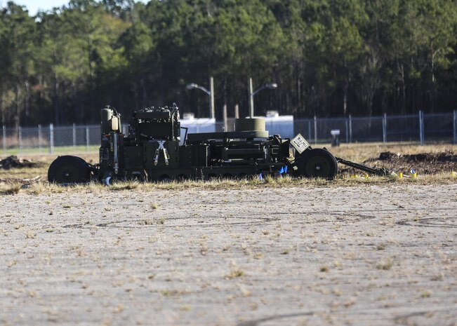 Marine Wing Support Squadron 272 assembled the M31 Marine Corps Expeditionary Arresting Gear during a field operation at Marine Corps Outlying Field, Camp Davis, N.C., Jan. 13, 2016. The M31 Marine Corps Expeditionary Arresting Gear is a hydrodynamic braking system used for tail hook aircraft, such as a F/A-18 Hornet, allowing planes to make aborted take-offs or emergency landings. (U.S. Marine Corps photo by Lance Cpl. Aaron Fiala/Released.)