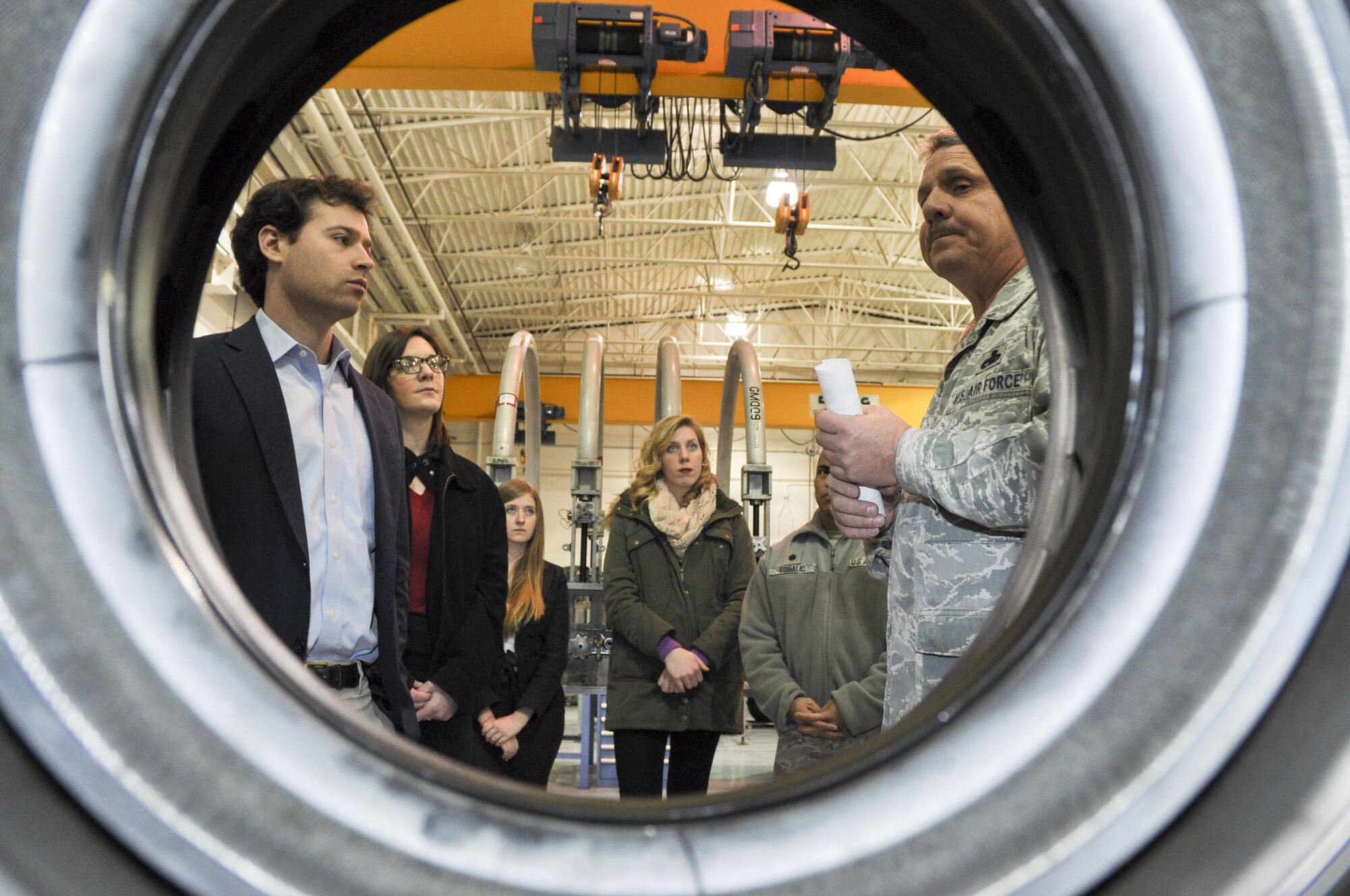 NAVAL AIR STATION FORT WORTH JOINT RESERVE BASE, Texas - Senior Master Sgt. Willard Brinson, 301st Maintenance Group engine shop, briefs 11 Congressional staffers Jan. 21 on equipment used to rebuild and maintain F-16 engines here. Serving to inform Capitol Hill defense staffers of Air Force Reserve contributions, the delegation visited the 301st Fighter Wing here and toured its Explosive Ordnance Disposal, engine shop and F-16 static display. (U.S. Air Force photo by Ms. Julie Briden-Garcia)