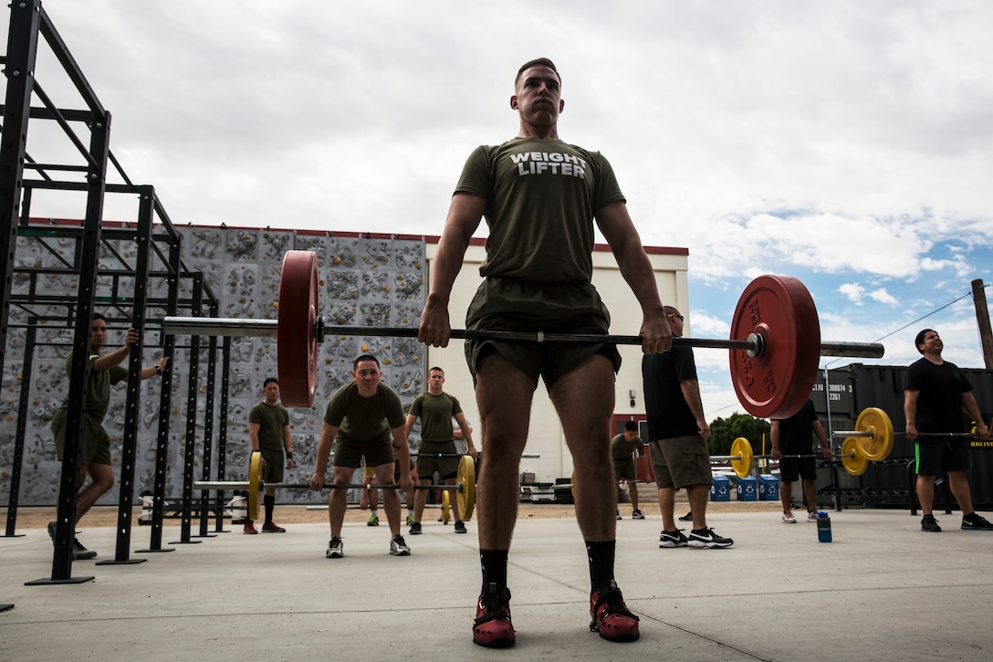 Sgt. Joshua Morris, an air traffic controller with Marine Air Control Squadron 1 based out of Marine Corps Air Station Yuma, Ariz., executes a Romanian deadlift during a High Intensity Tactical Training (HITT) level 1 instructor’s course at the station gym aboard MCAS Yuma, Wednesday, Oct. 28, 2015. (United States Marine Corps photo by: Pvt. George Melendez/ Released)