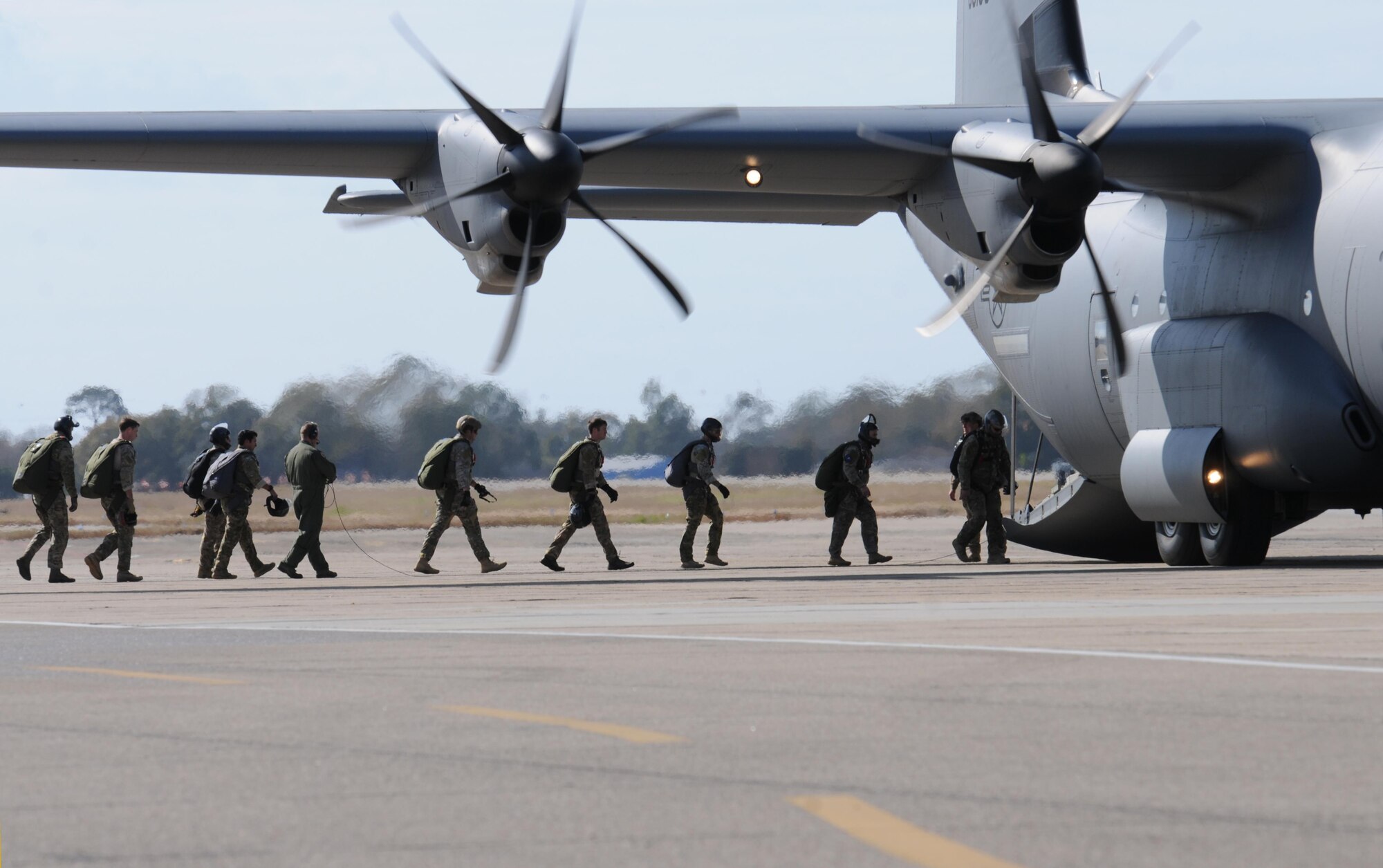 Members of the 334th and 335th Training Squadrons board a C-130J Hercules in preparation for a parachute jump Jan. 20, 2016, Keesler Air Force Base, Miss. Keesler’s battlefield Airmen instructors periodically perform the routine training exercise to maintain their proficiency. (U.S. Air Force photo by Kemberly Groue)