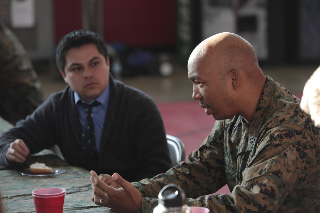 Master Sgt. Gregory L. Griffin, operations chief with 2nd Battalion, 24th Marine Regiment, 4th Marine Division, Marine Forces Reserve speaks to Columbia College Chicago students about the global war on terrorism during an informal discussion at their training center in Chicago, Jan. 20, 2016. During the event, the Marines and students were separated into small groups where they began to talk and share personal stories and experiences about their military career. Many Americans, like the majority of these students, do not have regular interactions with Marines. As the most geographically dispersed command in the Marine Corps, however, Marine Forces Reserve is uniquely positioned to have these kinds of community interactions.