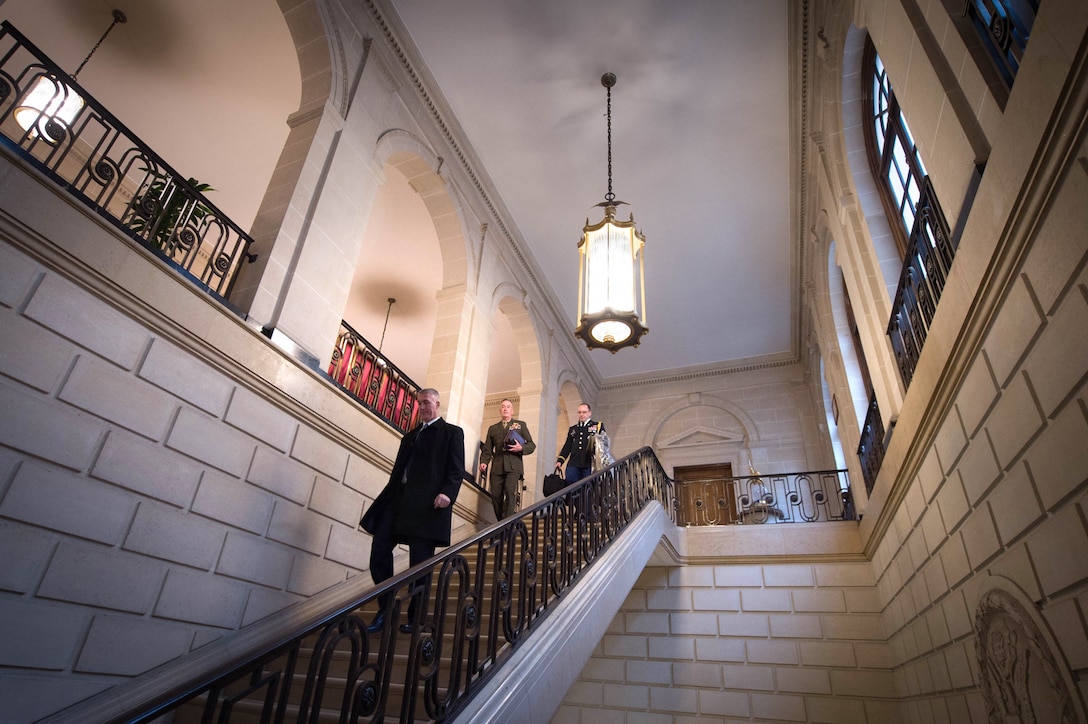 U.S. Marine Corps Gen. Joseph F. Dunford Jr., center, chairman of the Joint Chiefs of Staff, leaves the U.S. Embassy after meeting with U.S. Ambassador to France Jane D. Hartley in Paris, Jan. 22, 2016. DoD photo by D. Myles Cullen