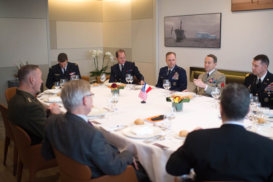 U.S. Marine Corps Gen. Joseph F. Dunford Jr., left, chairman of the Joint Chiefs of Staff, and Gen. Pierre de Villiers, second from right, chief of France's defense staff, have a working lunch in Paris, Jan. 22, 2016. DoD photo by D. Myles Cullen