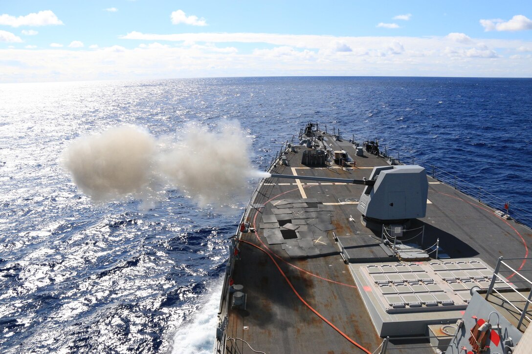 The Arleigh Burke-class guided-missile destroyer USS McCampbell fires an MK 45 5-inch lightweight gun during a live-fire exercise in the Philippine Sea, Jan. 17, 2016. The McCampbell is on patrol in the U.S. 7th Fleet area of operation to support security and stability in the Indo-Asia-Pacific region.   Navy photo by Ensign Soon Kwon