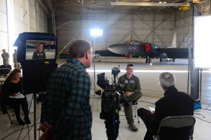 Lt. Col. Michael Gilmore, 99th Reconnaissance Squadron commander, is interviewed by media Jan. 21, 2016, at Beale Air Force Base, California. Gilmore provided expertise on the current capabilities of the U-2 Dragon Lady to be featured on the upcoming “Bridge of Spies” DVD extras release. (U.S. Air Force photo by Senior Airman Bobby Cummings)