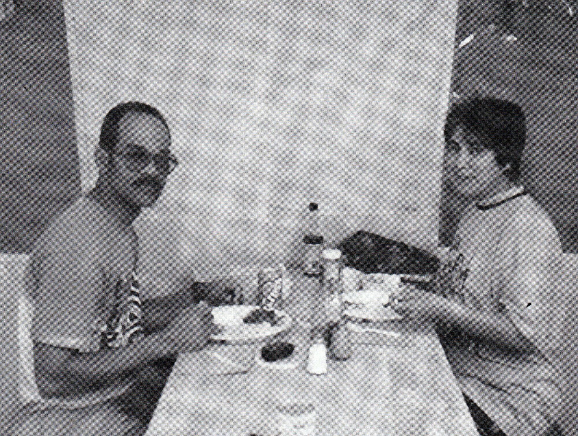 Two members of the 907th CAMS maintenance team, Tech. Sgts. David Valentine and Vivian Benavidez, dine in the Oasis East Dining Tent. (Courtesy of the 445th Airlift Wing History Office)