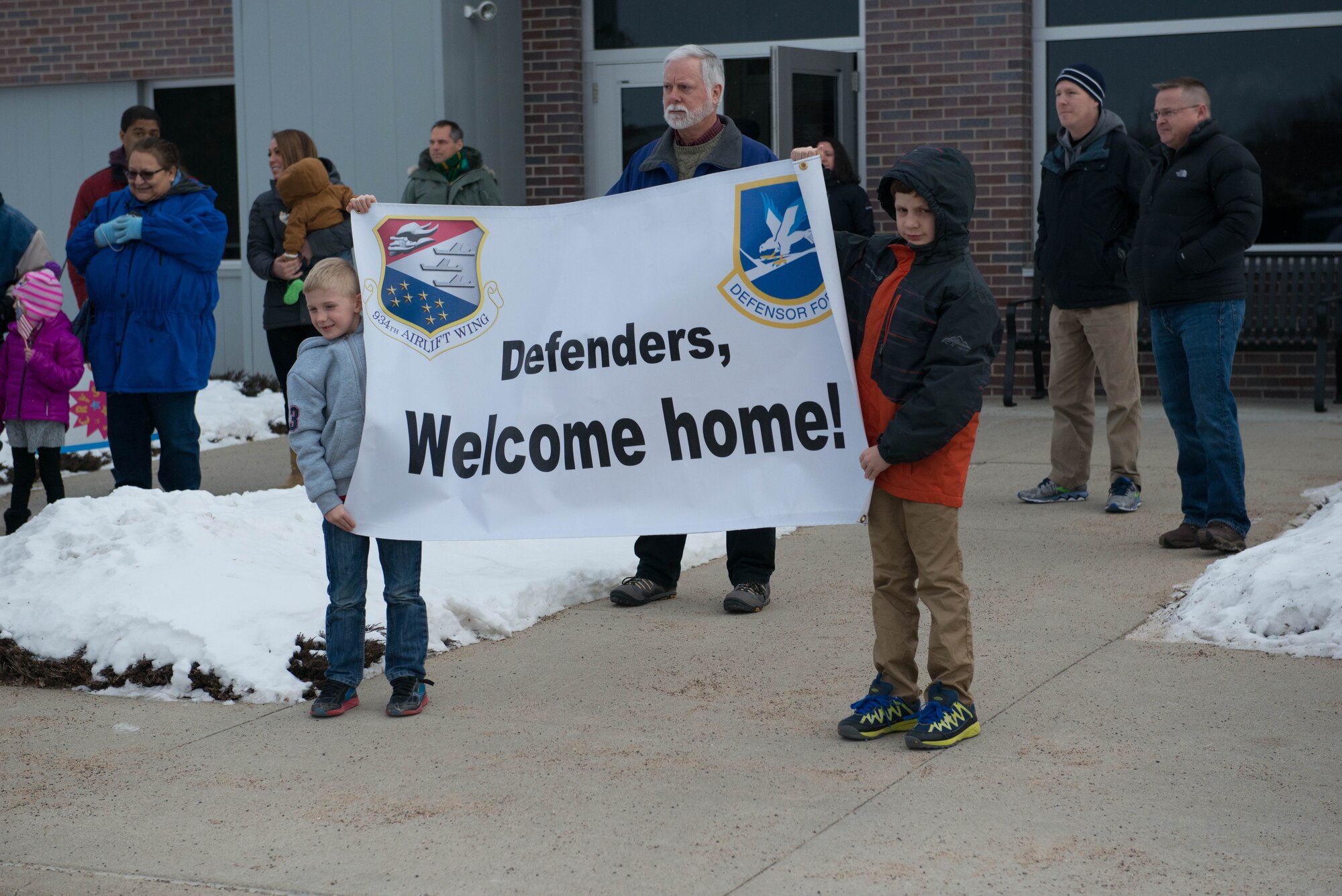 934th Security Forces Squadron members return home Jan. 18 after their deployment to Southwest Asia. (Air Force Photo/Capt. William-Joseph Mojica)