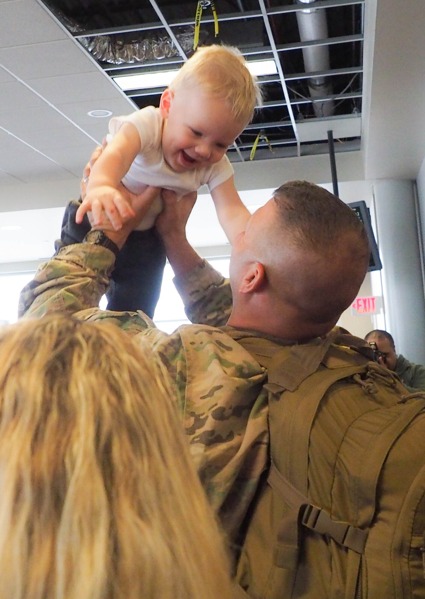 Members of the 934th Civil Engineer Squadron return home Jan. 21 after their deployment to Southwest Asia. (Air Force Photo/Paul Zadach)
