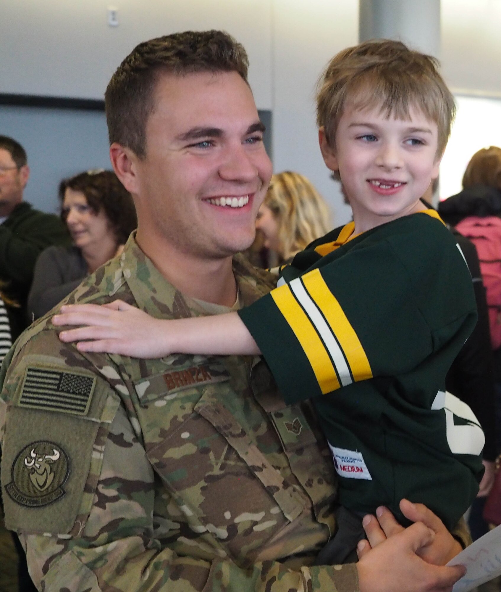 Members of the 934th Civil Engineer Squadron return home Jan. 21 after their deployment to Southwest Asia. (Air Force Photo/Paul Zadach)
