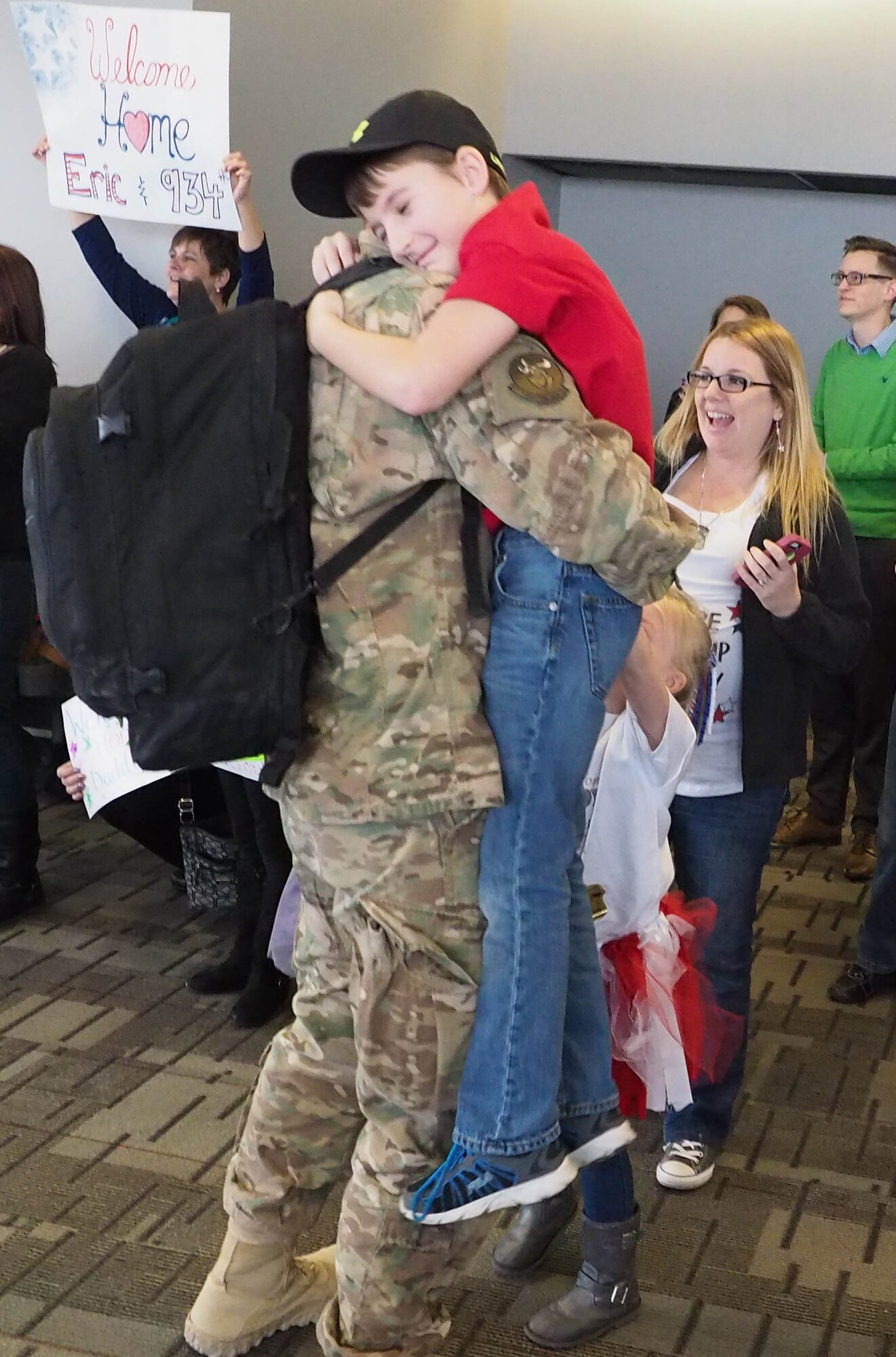 Members of the 934th Civil Engineer Squadron return home Jan. 21 after their deployment to Southwest Asia. (Air Force Photo/Paul Zadach)