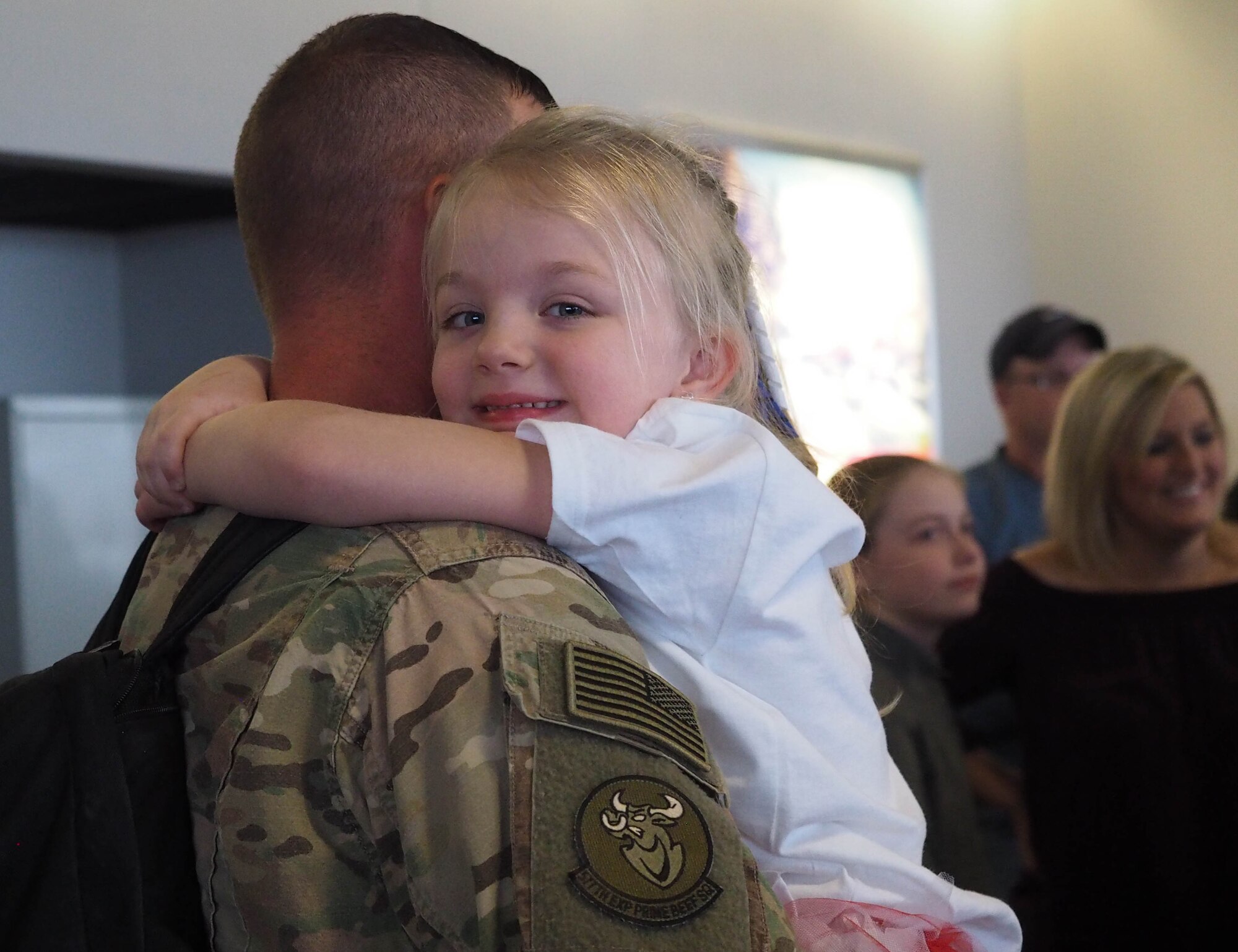 Members of the 934th Civil Engineer Squadron return home Jan. 21 after their deployment to Southwest Asia. (Air Force Photo/Paul Zadach)