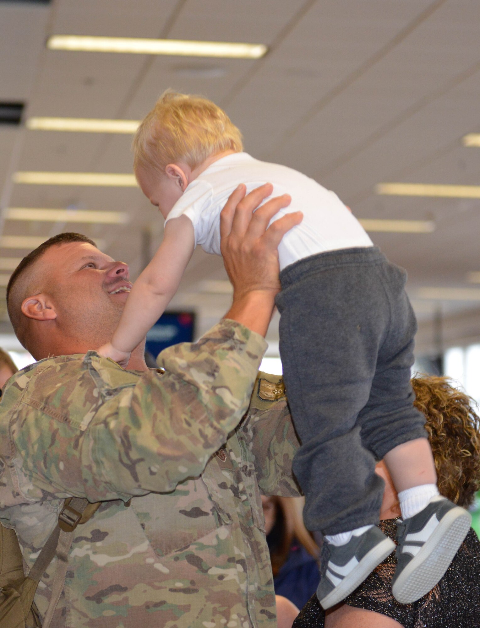 Members of the 934th Civil Engineer Squadron return home Jan. 21 after their deployment to Southwest Asia. (Air Force Photo/Capt. William-Joseph Mojica)