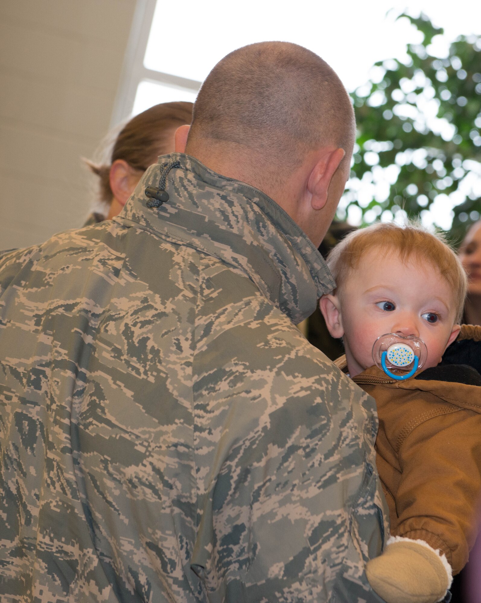934th Security Forces Squadron members return home Jan. 18 after their deployment to Southwest Asia. (Air Force Photo/Capt. William-Joseph Mojica)