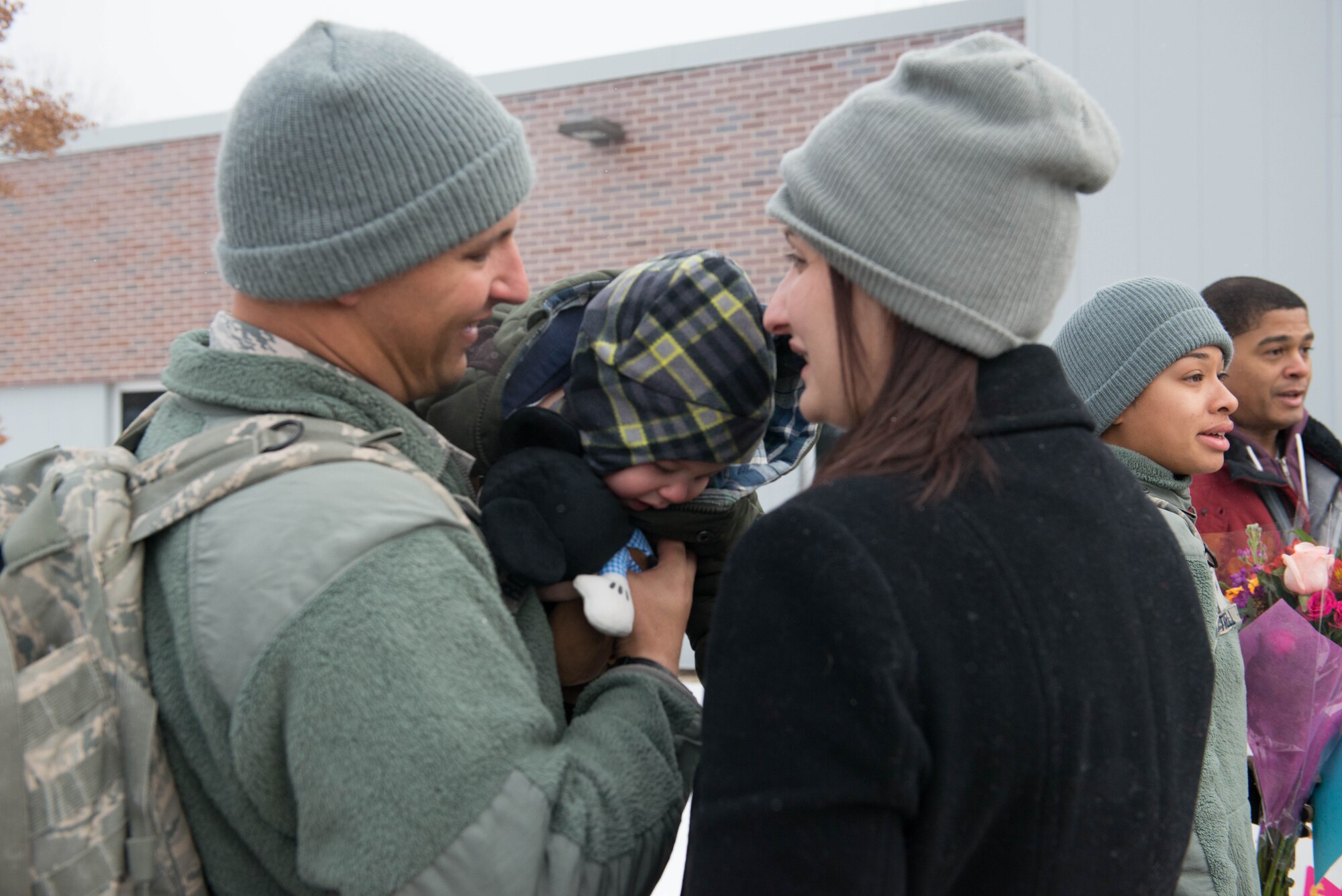 934th Security Forces Squadron members return home Jan. 18 after their deployment to Southwest Asia. (Air Force Photo/Capt. William-Joseph Mojica)