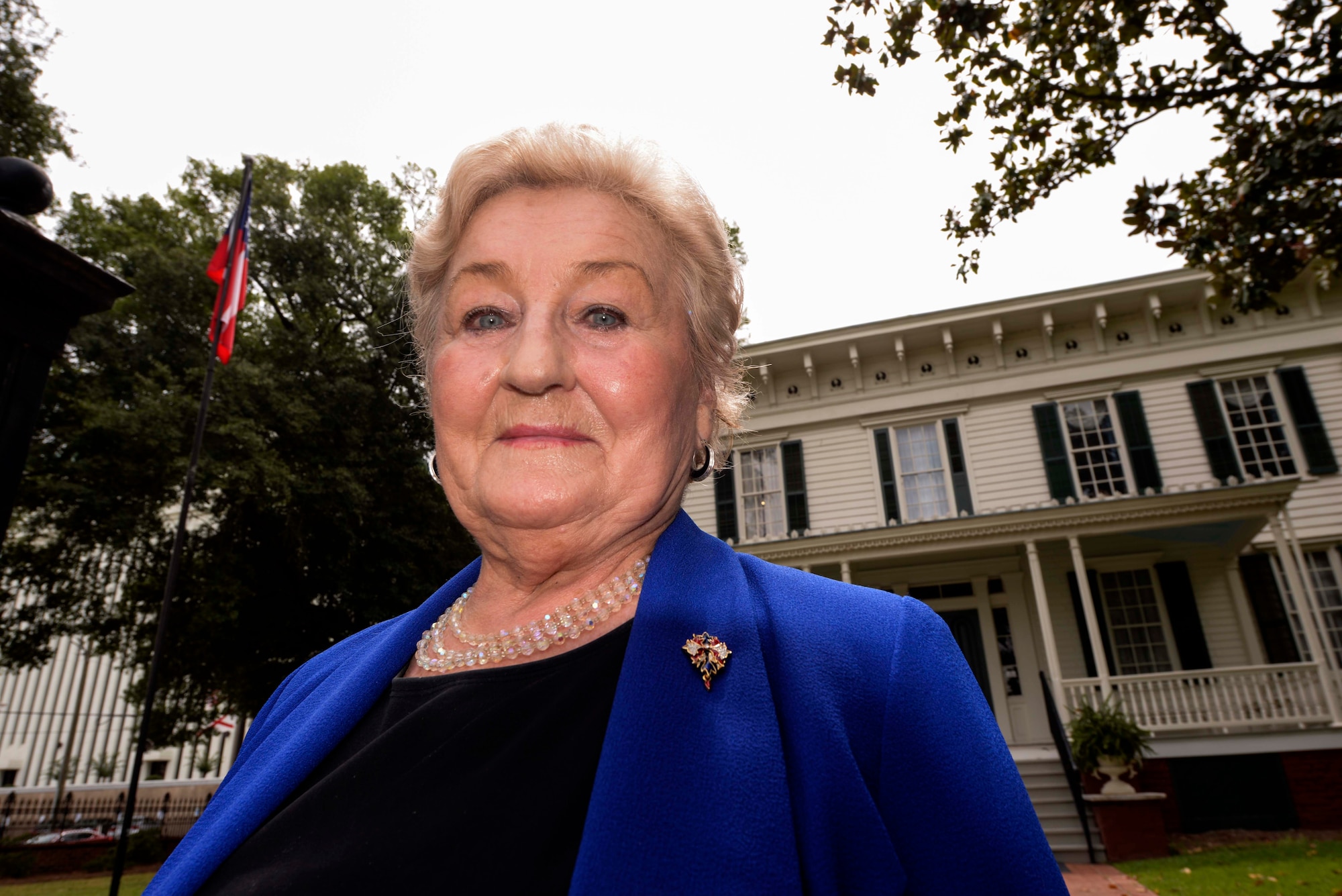 Eva Newman, White House of Confederacy receptionist, poses in front of the White House of Confederacy while working at the museum Montgomery Alabama. Newman became fascinated with the history of the house and its role in the Civil War and began working there to share its history with others. (U.S. Air Force photo by Airman 1st Class Alexa Culbert)