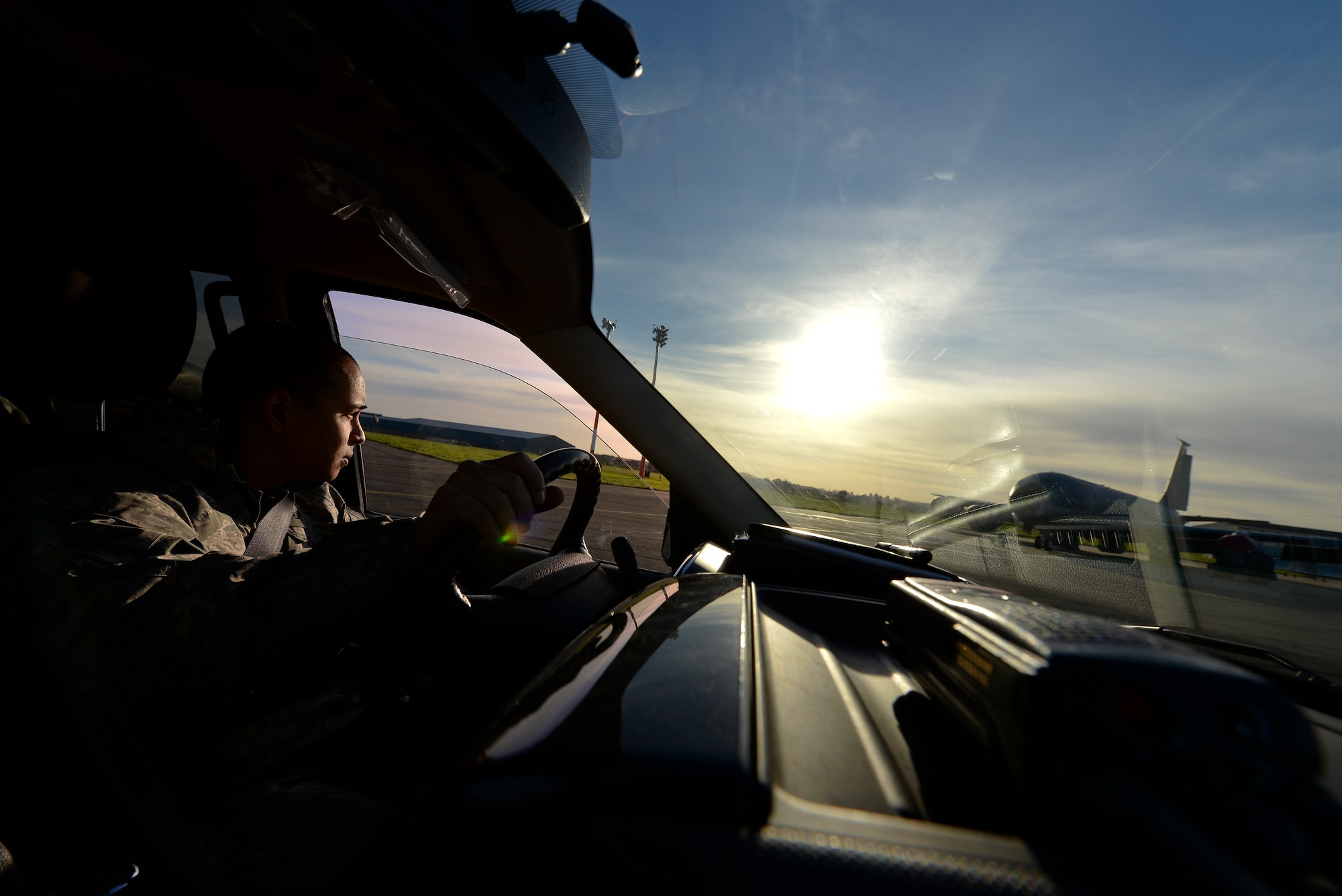 U.S. Air Force Staff Sgt. Karl Asuncion, 100th Maintenance Group jets quality assurance inspector, searches the flightline for unscheduled maintenance Jan. 13, 2016, on RAF Mildenhall, England. Inspectors plan their day on the projected maintenance scheduled for that day, however while out they also search for unscheduled maintenance to ensure the safety of Airmen and efficiency of maintenance being conducted on the aircraft. (U.S. Air Force photo by Staff Sgt. Micaiah Anthony/Released)