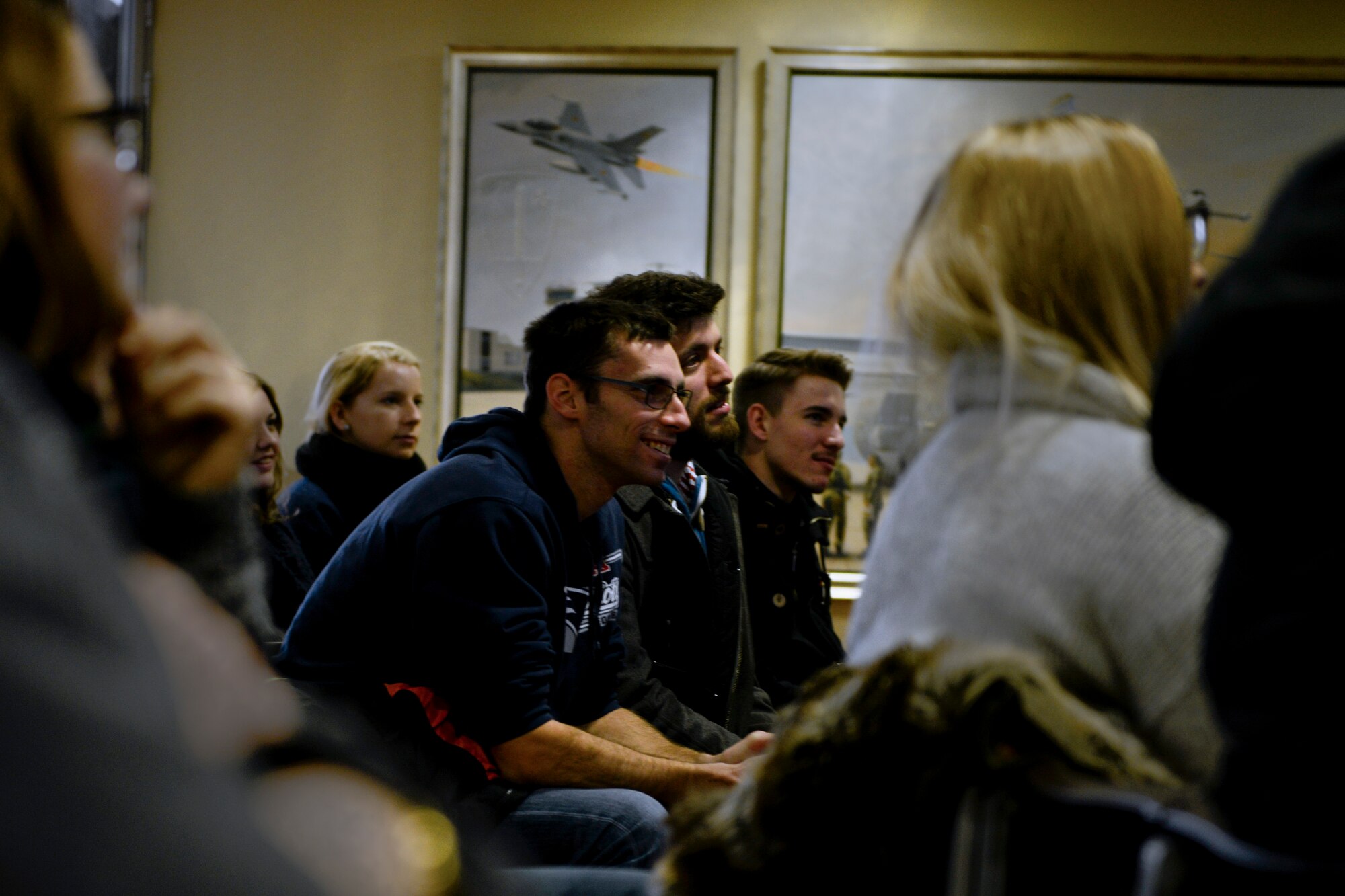 Students from the University of Mainz listen as Dr. Silvano Wueschner, 86th Airlift Wing historian, provides a history and mission brief of Ramstein Air Base  to University of Mainz students during a base tour here, Jan. 20, 2015. The host nation office coordinated the tour to highlight the economic relationship and cultural aspects of both the U.S. armed forces and NATO presence in the Palatinate region. (U.S. Air Force photo/Senior Airman Nicole Sikorski)