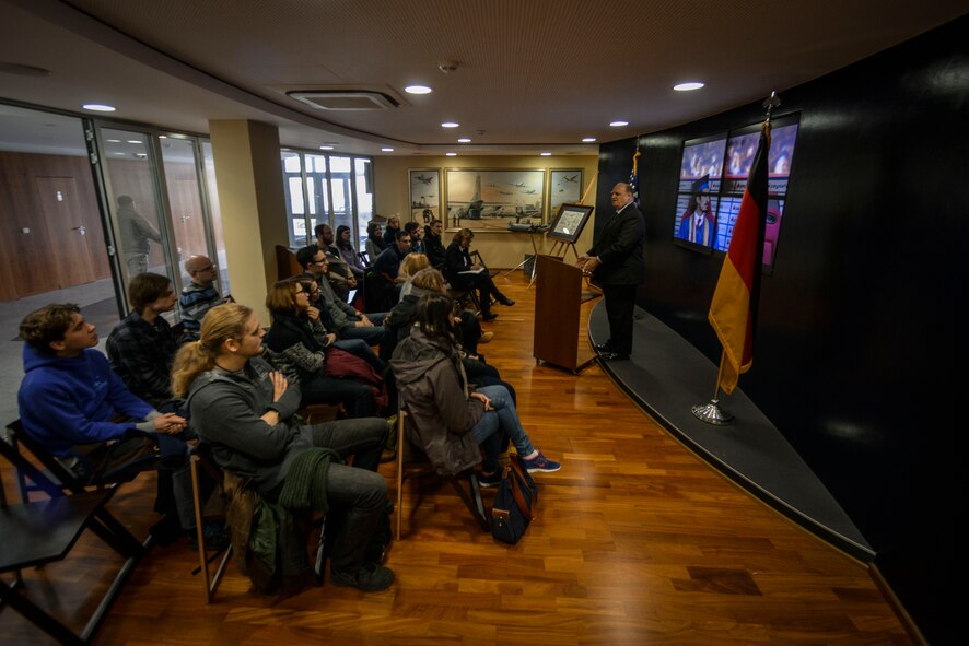 Dr. Silvano Wueschner, 86th Airlift Wing historian, provides a history and mission brief of Ramstein Air Base  to University of Mainz students during a base tour here, Jan. 20, 2015. The host nation office coordinated the tour to highlight the economic relationship and cultural aspects of both the U.S. armed forces and NATO presence in the Palatinate region. (U.S. Air Force photo/Senior Airman Nicole Sikorski) 