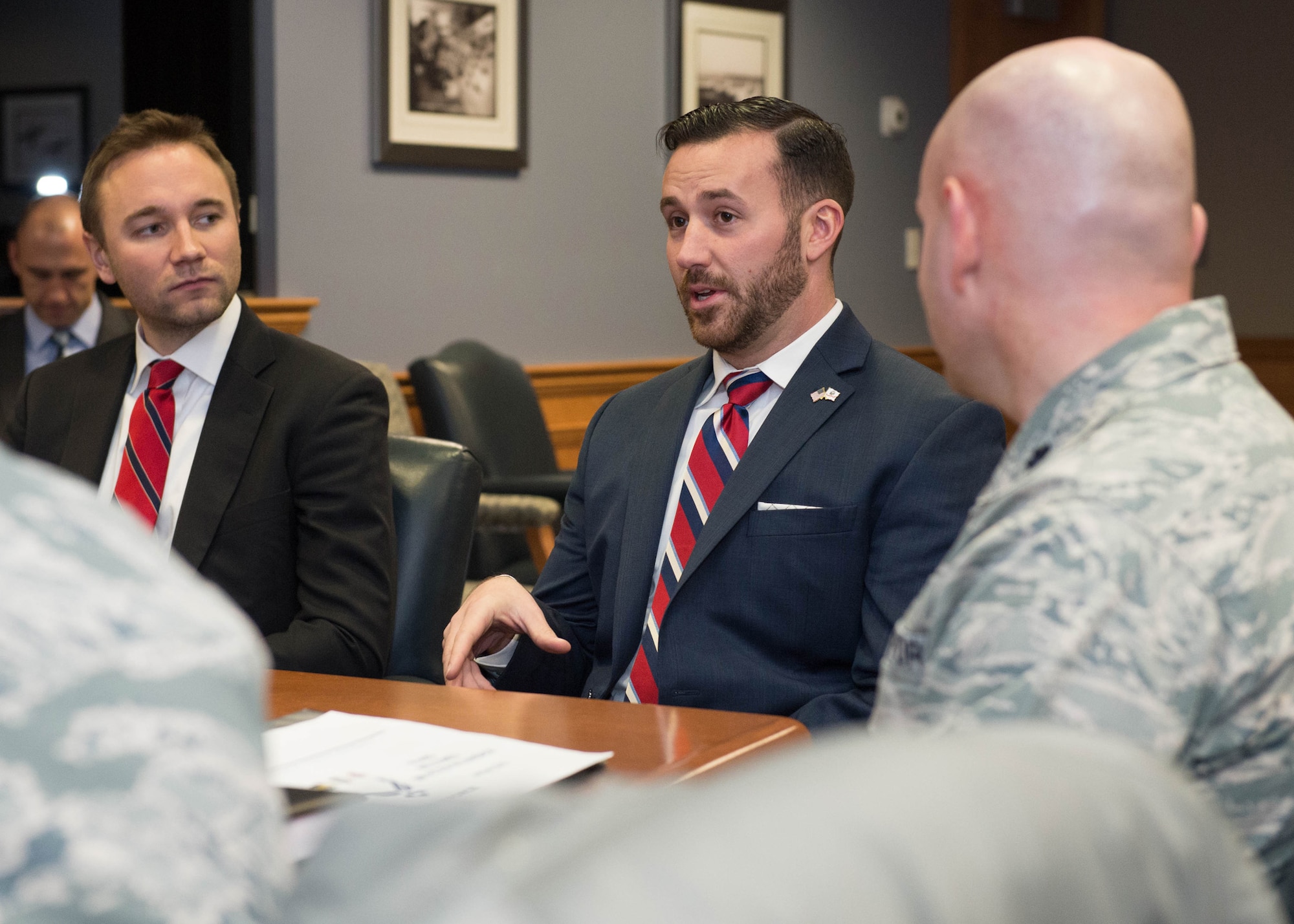 Peter Billerbeck, left, military legislative assistant to U.S. Rep. Seth Moulton, and Dennis Magnasco from the congressman’s district staff talk with 66th Air Base Group Commander Lt. Col. David Dunklee and other Hanscom leaders at the base Jan. 21. The Congressional staffers also received comprehensive overview briefings from Hanscom’s program executive officers, Maj Gen. Craig Olson and Steven Wert, and took a windshield tour of the base. (U.S. Air Force photo by Jerry Saslav)