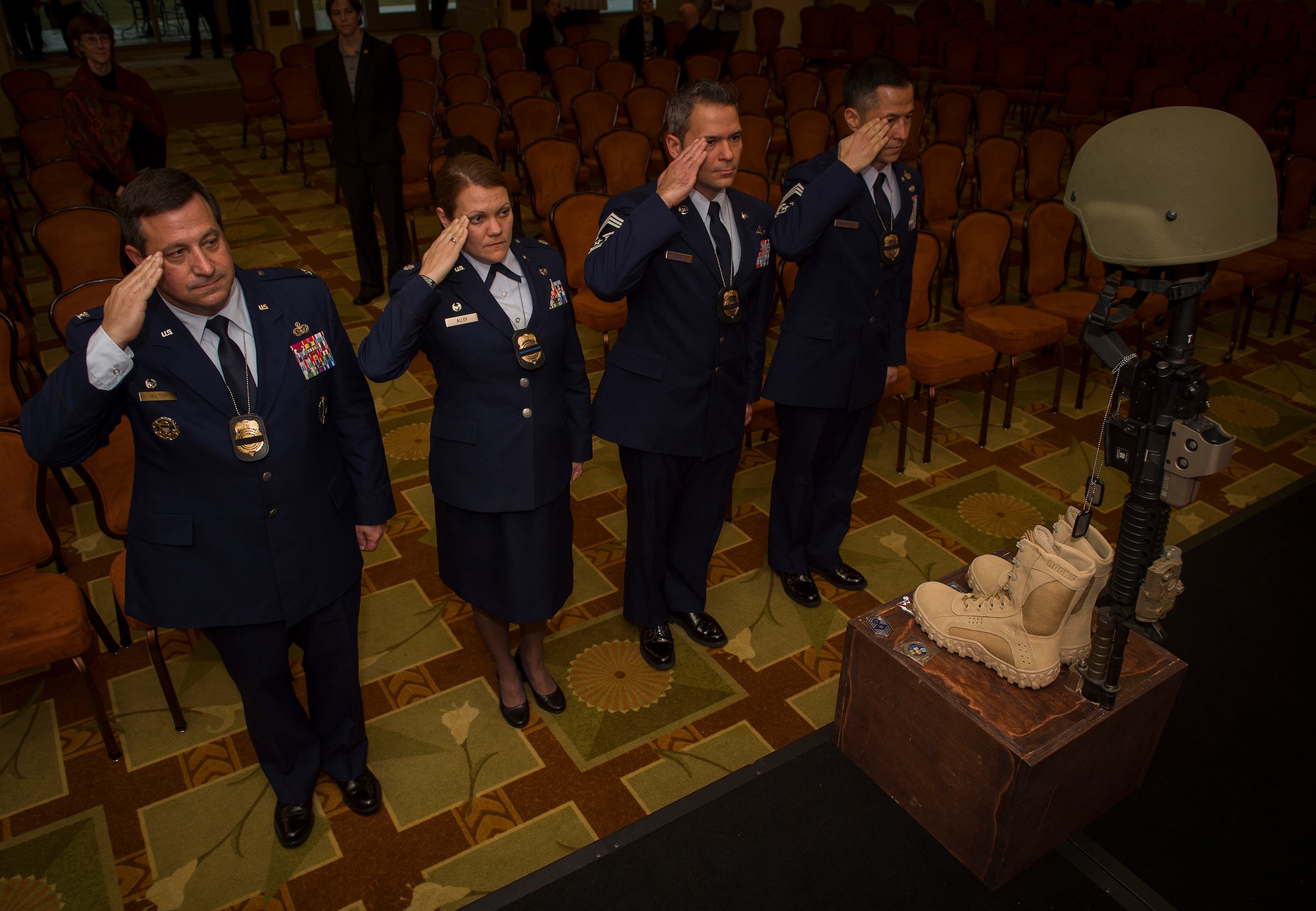 Fellow Air Force Office of Special Investigations Airmen render a final salute during the memorial service for Maj. Adrianna Vorderbruggen at the Soundside on Hurlburt Field, Fla., Jan. 21. Vorderbruggen was a special agent assigned the OSI squadron located on Eglin Air Force Base, Fla.  She was killed in action Dec. 21, 2015 during a deployment to Bagram Airfield, Afghanistan. (U.S. Air Force photo by Airman 1st Class Kai White)