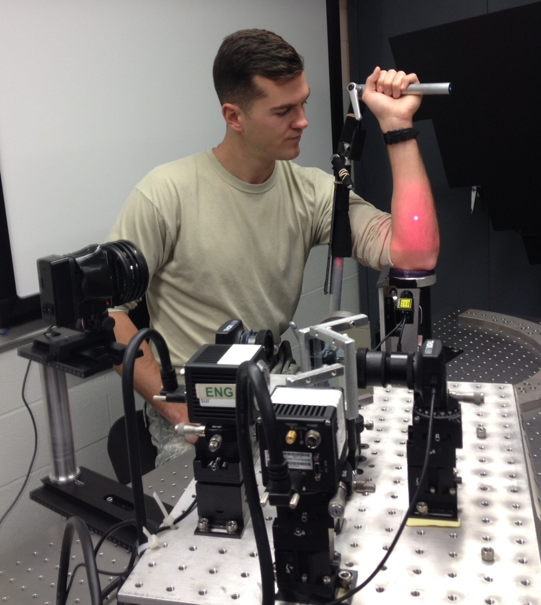 2nd Lt. Jeffrey Bintz demonstrates mirror-like reflection off of skin to improve detection