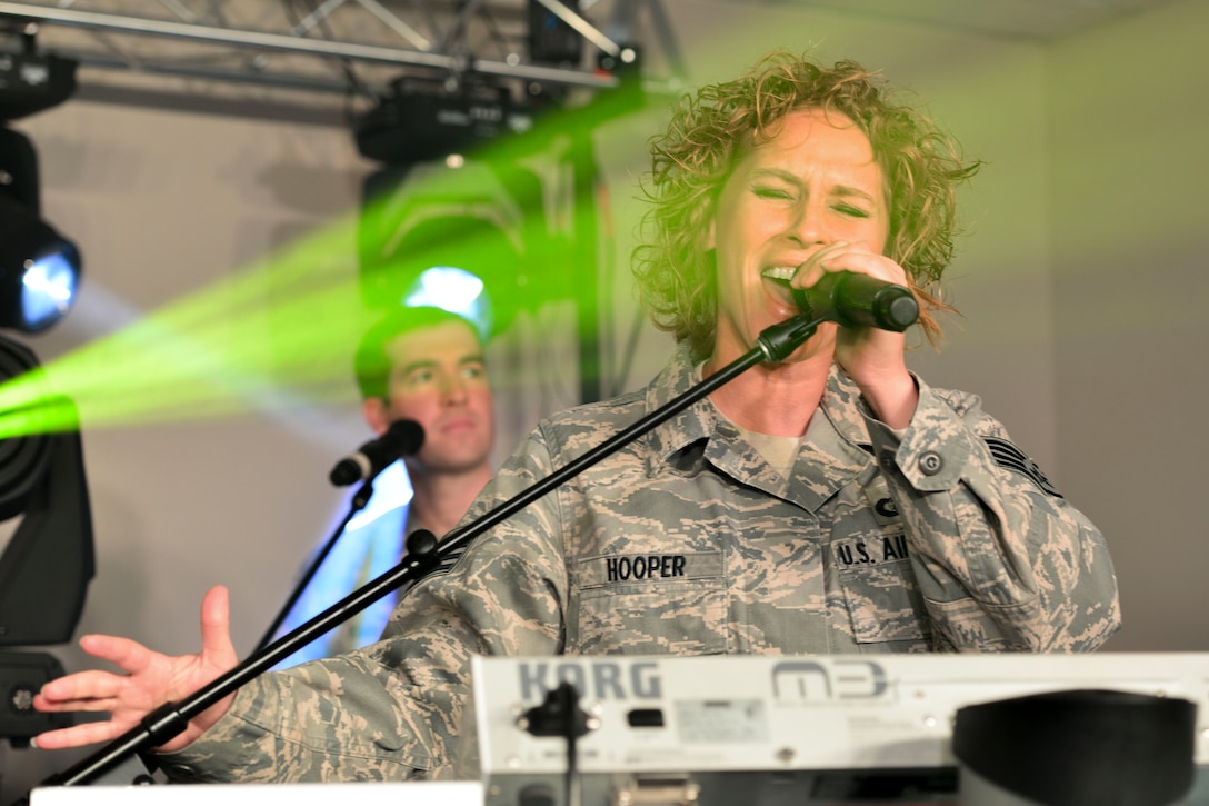 U.S. Air Force Staff Sgt. Michelle Hooper, Full Spectrum music director, sings during a rehearsal at Langley Air Force Base, Va., Jan. 20, 2016. Hooper was part of the band’s 110- day deployment to parts of the Middle East and Southwest Asia, where they performed in the regions’ schools and malls, as well as on radio and television shows. (U.S. Air Force photo by Tech. Sgt. Katie Gar Ward)