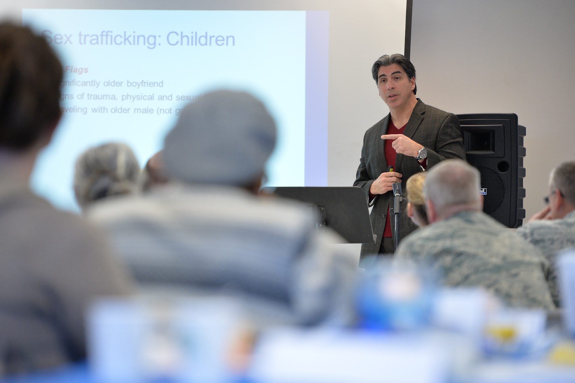 Fire Capt. Fernando Rivera speaks to members of Team Hill during a Combating Trafficking in Persons awareness breakfast, Hill Air Force Base, Utah, Jan. 21. Rivero is a member of the Utah Sexual Violence Council, Salt Lake Sexual Assault Response Team, Utah Coalition Against Sexual Assault and the education committee chair of the Utah Trafficking in Persons Task Force. (U.S. Air Force photo by R. Nial Bradshaw)