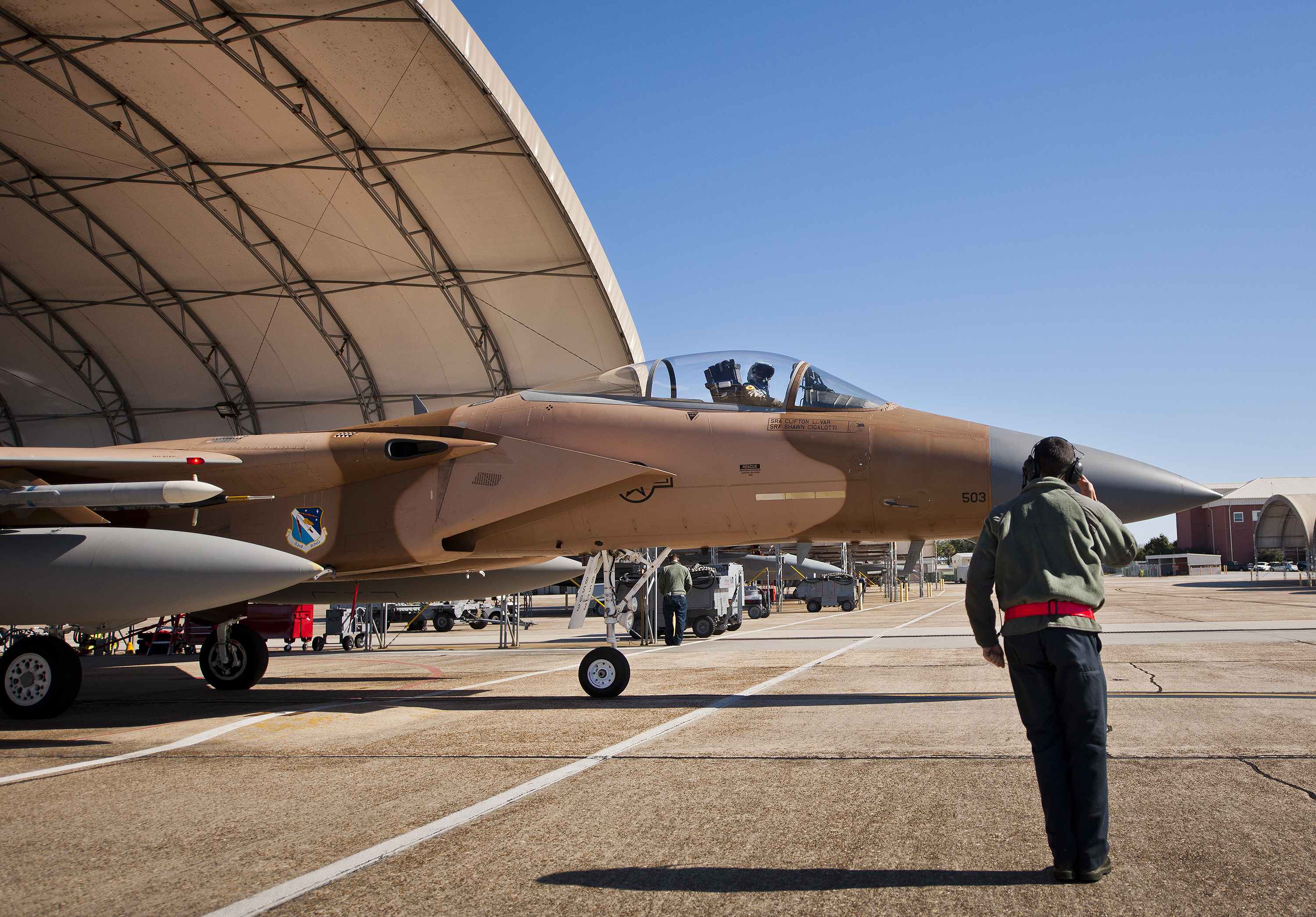 Maintainer prepares Camo F15 for final flight > Eglin Air Force Base