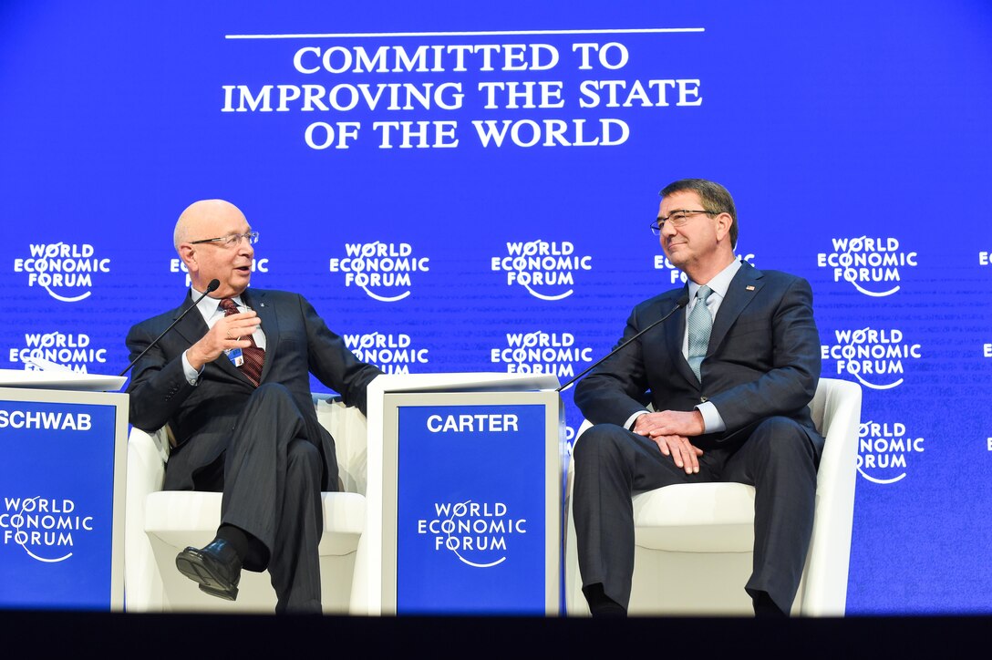 Defense Secretary Ash Carter speaks with Klaus Schwab, founder and executive chairman of the World Economic Forum, during a special session of the forum's annual meeting in Davos, Switzerland, Jan. 22, 2016. DoD photo by Army Sgt. 1st Class Clydell Kinchen