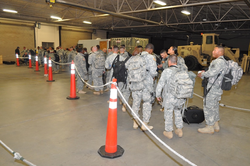 Soldiers assigned to the 88th Military Police Company, U.S. Army Reserve, turned in weapons at the Silas L. Copeland Arrival/Departure Air Control Group Dec. 18, 2015. The unit provided external security at Guantanamo Naval Base, Cuba.