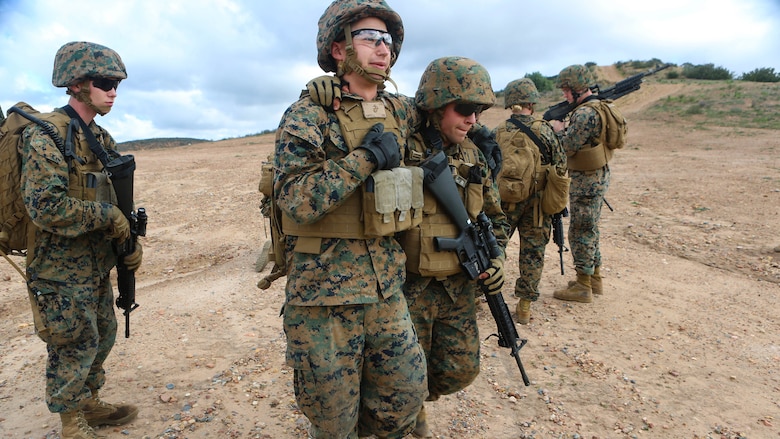 Marines with Marine Wing Headquarters Squadron (MWHS) 3 perform a simulated casualty evacuation during their Command Post Exercise aboard Marine Corps Air Station Miramar, California, Jan. 19. Marines with MWHS-3 participated in a three-day, two-night CPX designed to instill and improve field and tactical skills of the Headquarter Marines, Jan. 19-21.