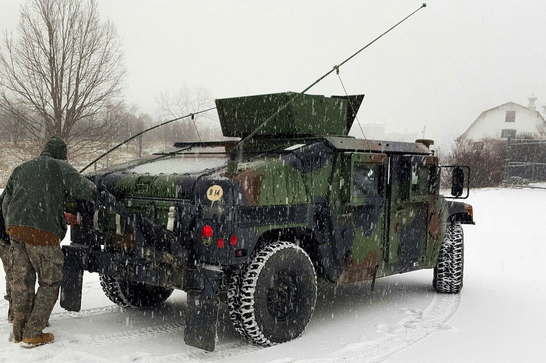 Soldiers and Verona Fire Department personnel prepare for winter weather response operations in Verona, Va., Jan. 22, 2016. The soldiers are assigned to the Virginia Army National Guard’s Headquarters Company, 116th Infantry Brigade Combat Team. Virginia National Guard photo by Army Sgt. Chris Martrano