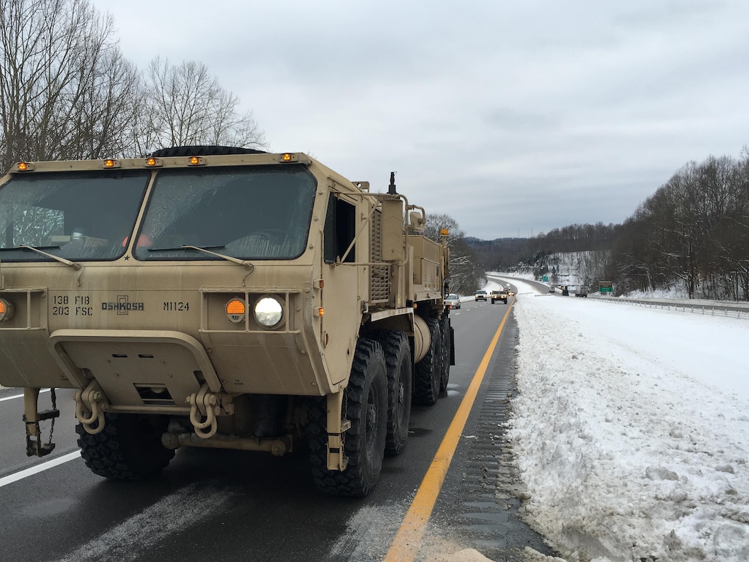 Soldiers supporting winter storm response operations patrol in a heavy expanded mobility tactical truck on Interstate 75 south of Lexington, Ky., Jan. 23, 2016. Kentucky National Guard photo