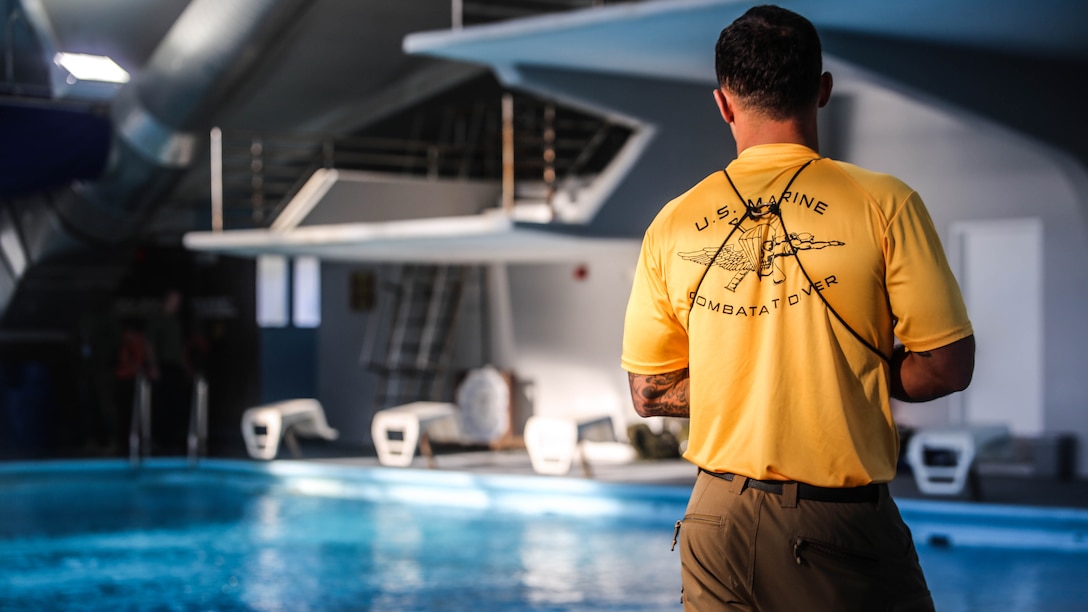 Gunnery Sgt. Justin Smallwood, a combatant diver instructor with Marine Combatant Dive School, observes divers going through different scenarios at Camp Lejeune, N.C., Jan. 19, 2016. The course certifies Marines as dive supervisors whose mission is to oversee dives and ensure that operations are conducted safely and effectively. 
